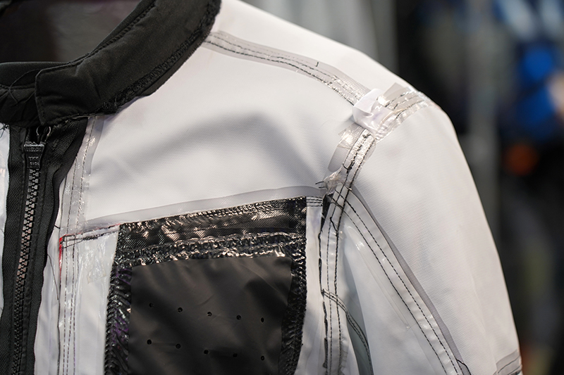 Cheap laminated motorcycle jacket construction
